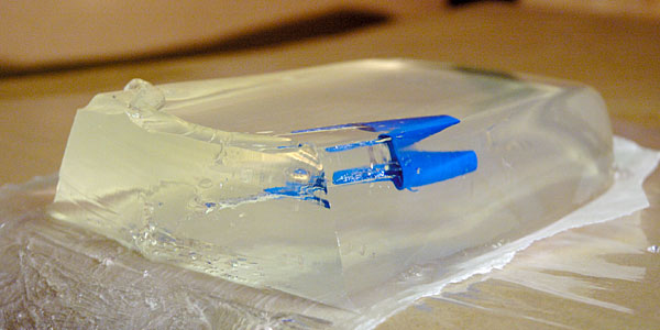 A view of a TEC cap inside the ballistic gel. Because of the refraction, the view is distorted and there are multiple views of the cap.